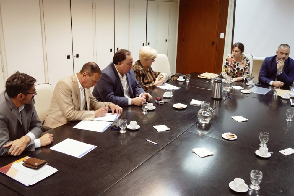 Arrieta y Contreras en la reunión. 